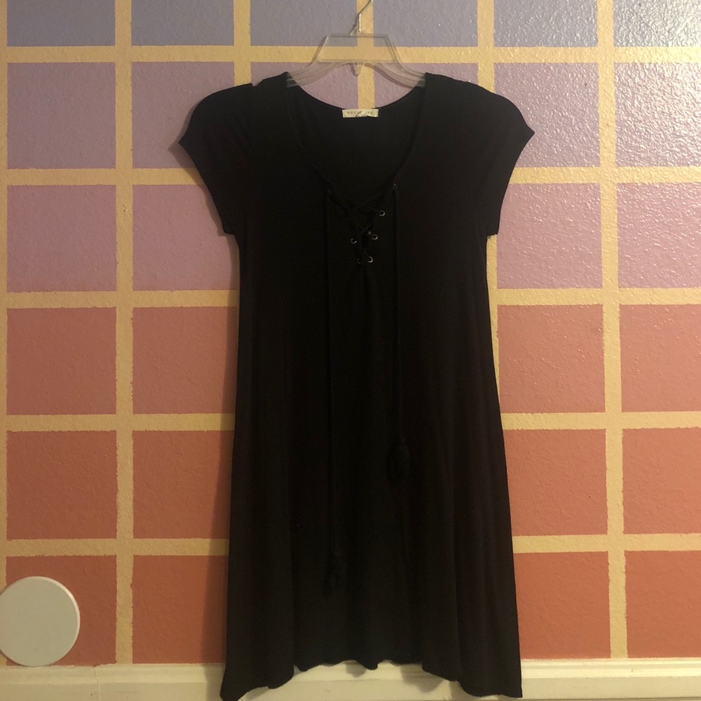 Black lace up dress.